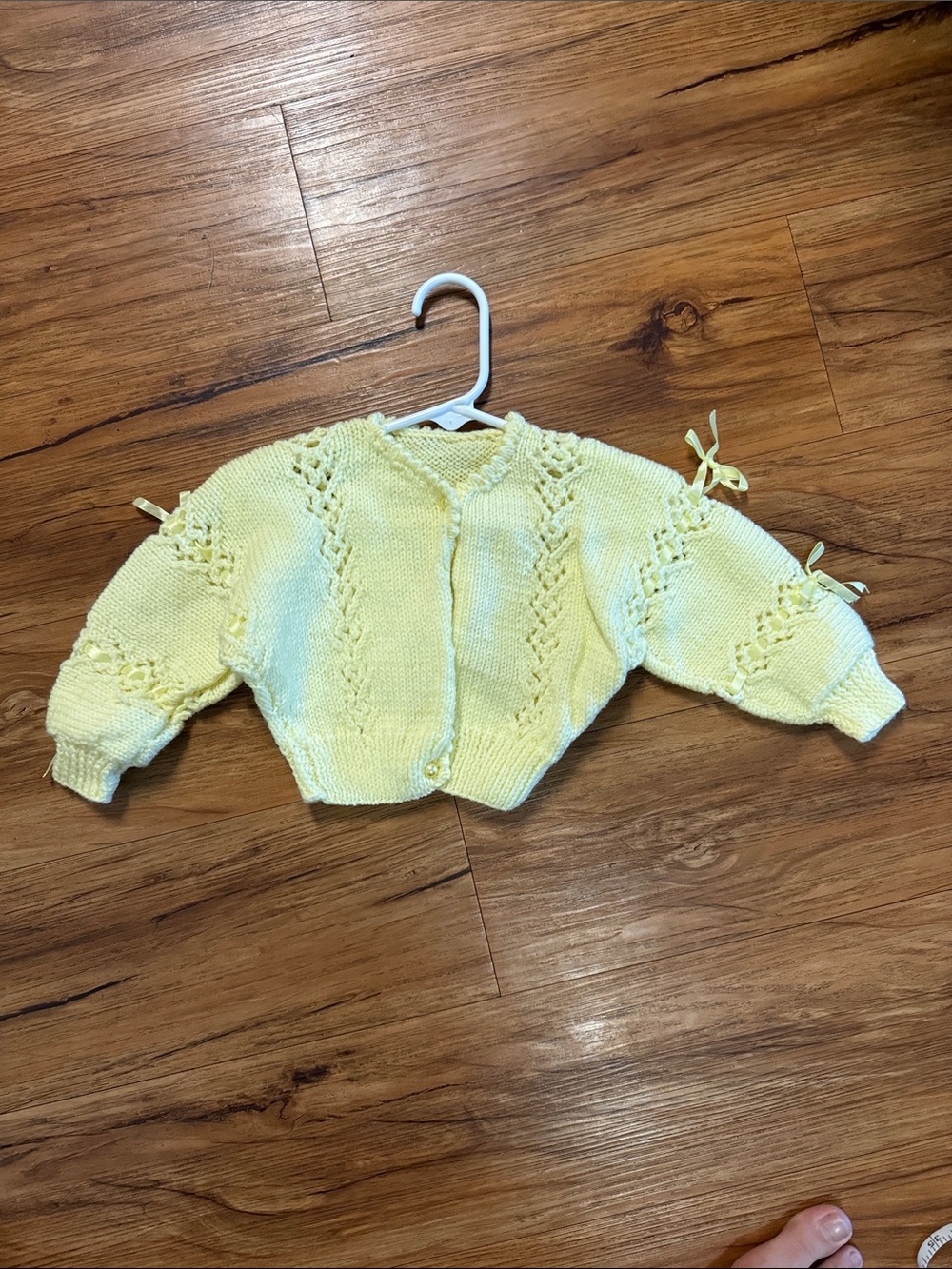 Soft yellow handmade baby sweater